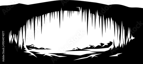 Icicle cave opening looking out to mountain landscape