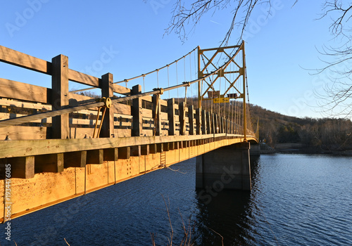One-lane wooden suspension bridge, Beaver Bridge, over the White River in Arkansas