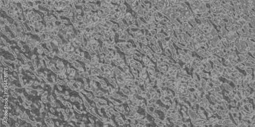 Highly detailed abstract grayscale textured background resembling rough stone or weathered metal with intricate organic patterns and a tactile surface effect