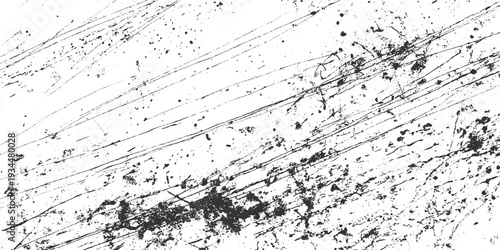 Black ink splatters and thin diagonal scratches on a white textured background abstract