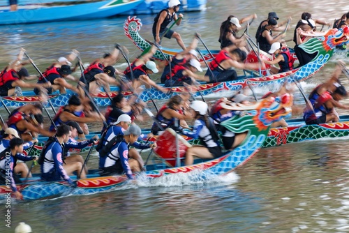 Wallpaper Mural Scene of a competitive boat racing in the Dragon Boat Festival in Taipei, Taiwan, where the athletes pull vigorously on the oars compete with all their strength in traditional colorful dragon boats Torontodigital.ca