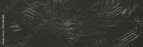Grunge rough dirty background with black scratched surface for creative projects and design use in multiple settings.