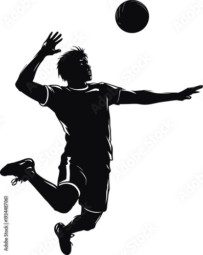 Black silhouette of a male volleyball player jumping in mid air to spike the ball for athletic performance sports competition and healthy lifestyle concepts.