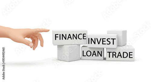 Hand reaching towards blocks with words FINANCE, INVEST, LOAN, TRADE