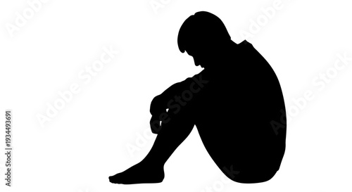 Sad person sitting alone depressed.
