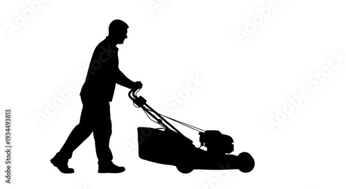 Man pushing lawn mower outdoors.