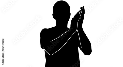 Man silhouette clapping hands together slowly.