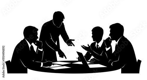 Businessmen sitting at meeting table.