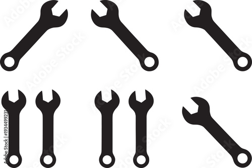 Black wrench icon set with various sizes and angles, mechanical repair tools, construction hardware symbols, diy home improvement vector illustration, technical service.