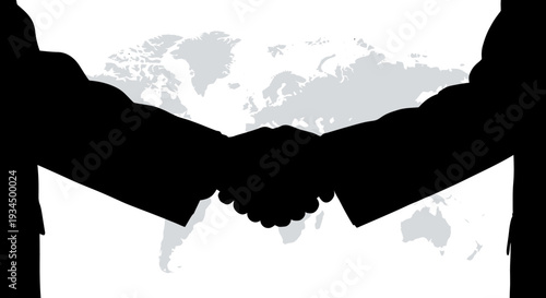 Two people shaking hands in agreement.
