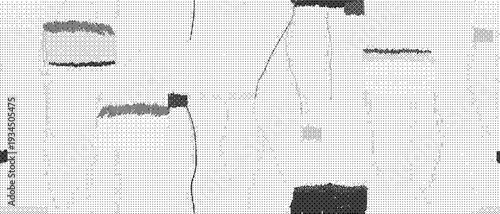 A collection of various abstract black and white shapes and designs on a textured gray background with no clear theme or subject