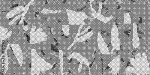 A gray and white abstract pattern with various shapes and leaves on a textured background