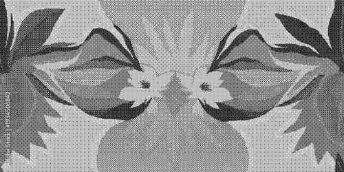 Detailed closeup of a leafy botanical design on gray textured surface