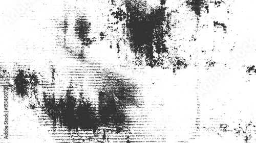 Black ink splatters and smudges on textured white paper with faint horizontal lines abstract background