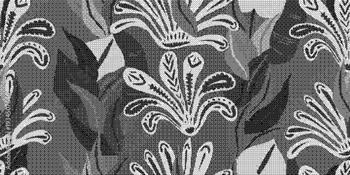 Closeup of a grey and white floral patterned fabric texture