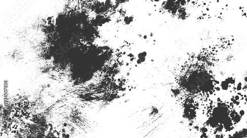 Black ink splatters and granular textures on a white background