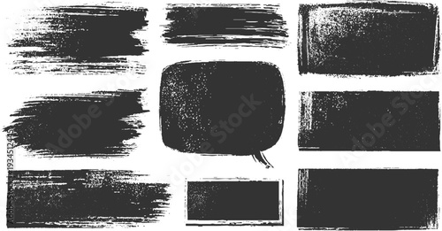 Collection of nine dark gray textured brush stroke shapes and speech bubble on white background abstract