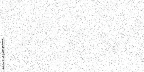 Subtle mosaic pattern background with small irregular grey and white geometric shapes creating a textured surface for design and decoration