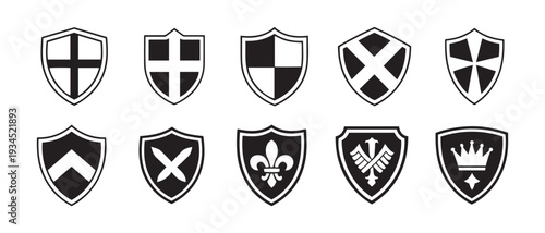 Collection of ten medieval heraldic shields and emblems on white background, various knightly symbols, vector illustration.