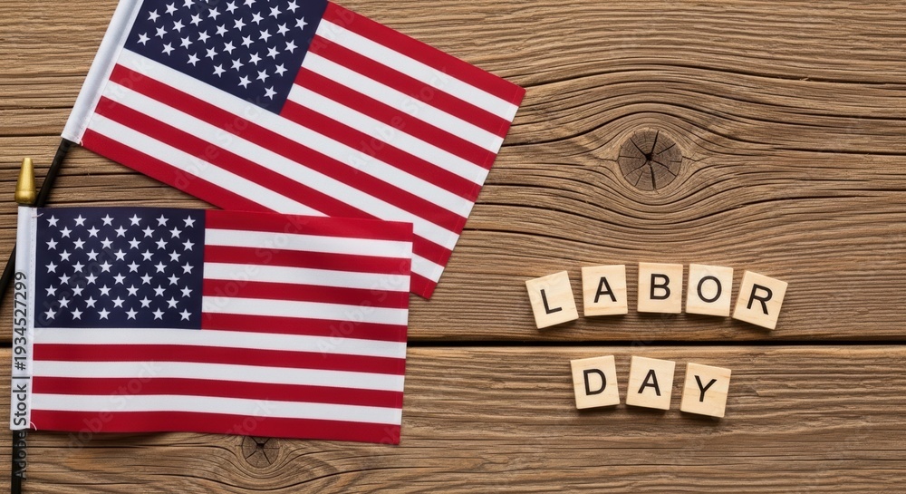 Obraz premium Two American Flags on Wooden Background with Labor Day Message