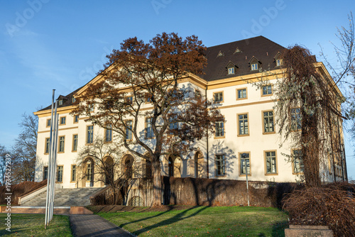 Full side view of the Cultural Center at the Leuna chemical site, Germany. Large GDR-era building used for events, conferences, and public gatherings.