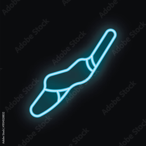 Blue neon sign depicting ballet shoes on a black background, ideal for illustrating concepts such as dance, performance, and grace