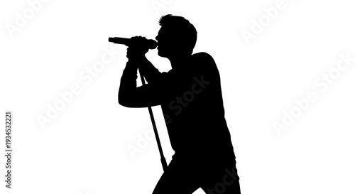 Man Singing into Microphone Silhouette.
