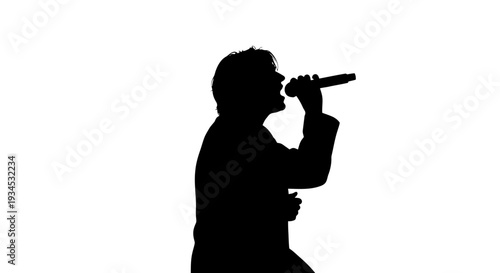 Man singing into a microphone.