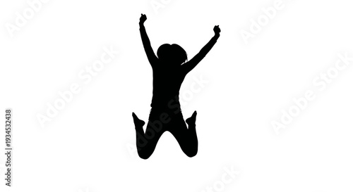 Silhouette of a jumping young person.