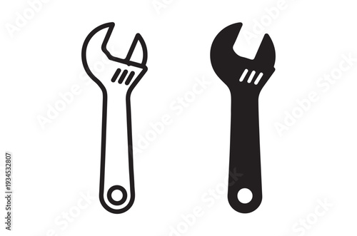 Two adjustable wrenches in contrasting black and white depictions