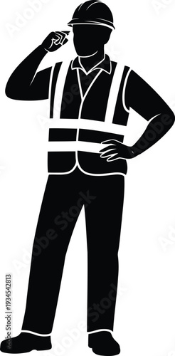 A construction worker in a hard hat and safety vest