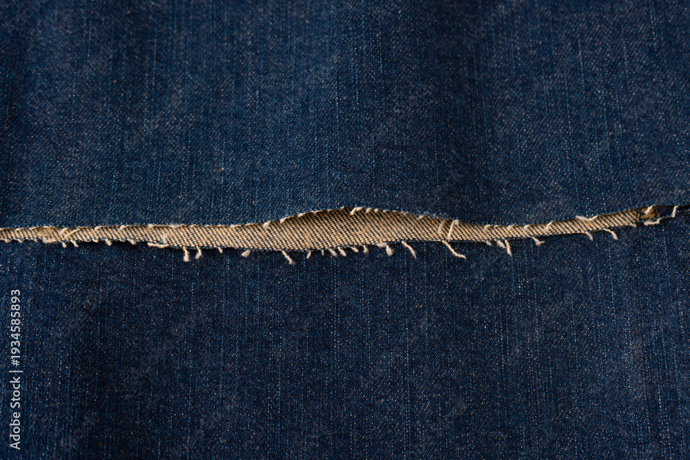 Εκτύπωση καμβά Blue denim fabric as a background. Top view.