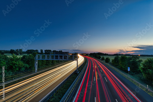German Autobahn at sunset with long exposure light trails