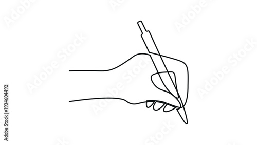 A hand holding a pen and writing on a surface