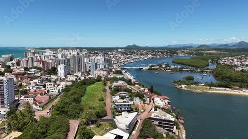 Aerial view of crowded beaches in downtown Guarapari during summer tourism season, Brazil	