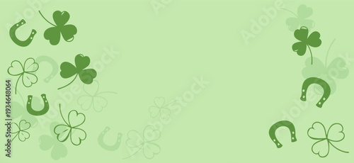 Green clover and horseshoe background with lucky shamrock design and copy space.