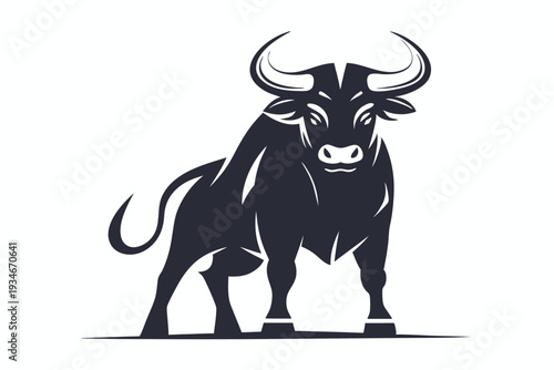 Intimidating black and white bull portrait displays fierce eyes and powerful horns clearly
