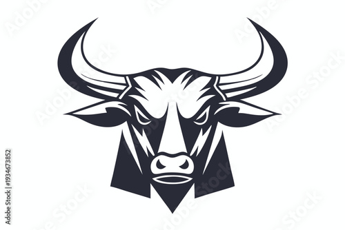 Intimidating black and white bull portrait displays fierce eyes and powerful horns clearly