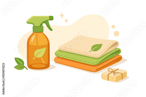 Cleaning supplies on a table with spray bottle towels and soap for