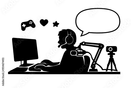 Person sitting at a desk with a computer while gaming and preparing to