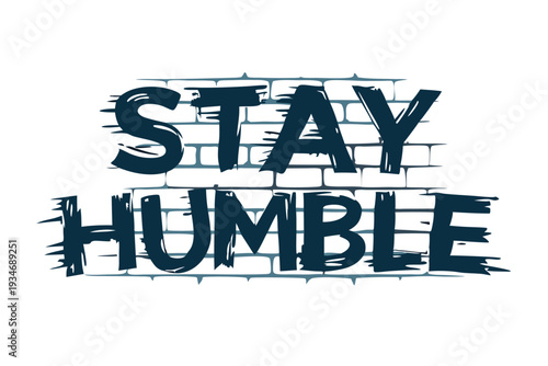 Grungy, blue 'Stay Humble' lettering artfully appears against the backdrop of a stylized brick wall