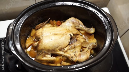 Whole Chicken in Slow Cooker with potatoes and carrots