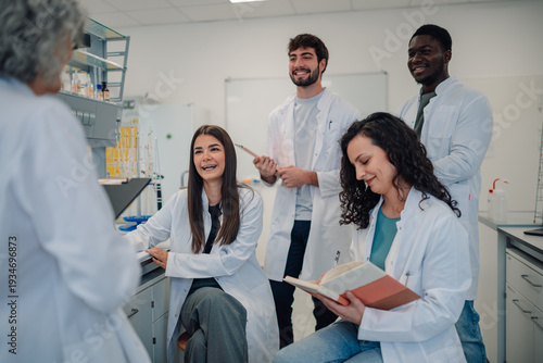 Wallpaper Mural Diverse students learning science from professor in laboratory Torontodigital.ca