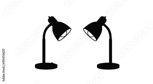 Two black desk lamps facing each other against a white background