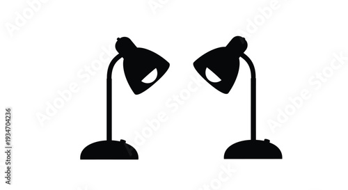 Two black lamps facing each other on a white background