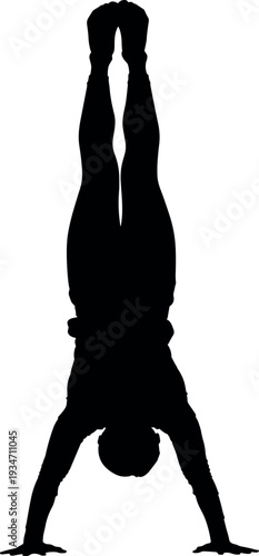 silhouette of a person performing a handstand exercise