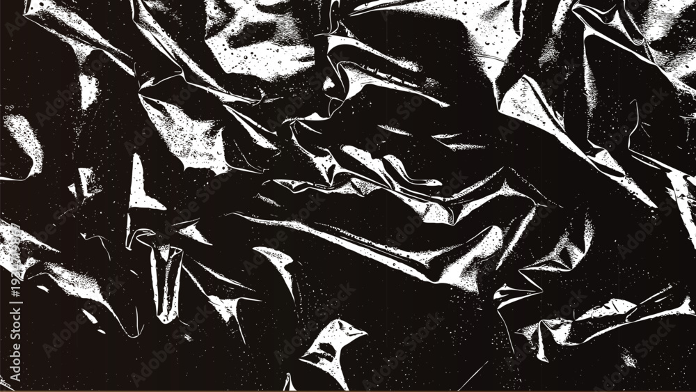 Naklejka premium Abstract black and white crumpled fabric with high contrast and dramatic shadows