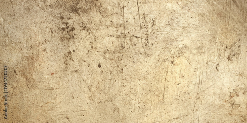 A vintage aged brown paper texture with a rough grunge surface and blank beige pattern resembles a natural stone or weathered concrete material