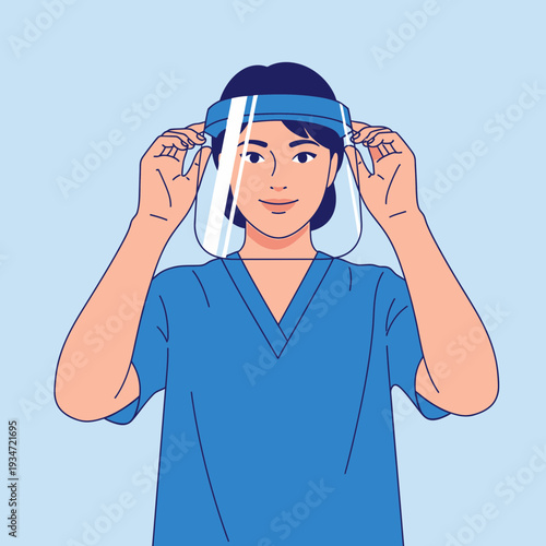 Healthcare Professional Wearing Protective Face Shield Demonstrates Safety Protocol in Clinical