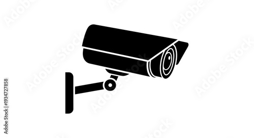 Security camera on a wall mount.